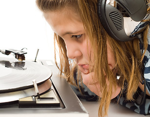 Image showing Child Watching Record Player