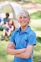 Image showing Boy, kid with smile and arms crossed at summer camp and nature with fun outdoor for youth. Child at campsite in forest, adventure and vacation, childhood and recreation with happiness in portrait