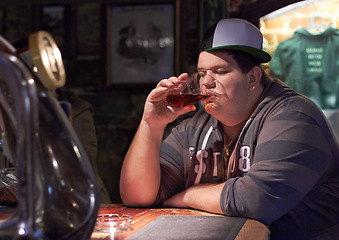 Image showing Man in pub, beer and drinking alone, plus size and depressed with alcohol, mental health or life mistake. Body image crisis, angry or sad with alcoholic beverage in glass, frustration and loneliness