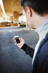 Image showing Man, runner and checking fitness progress in outdoors, screen and exercise or training for marathon. Male person, athlete and workout by city background, mobile app and performance challenge or timer