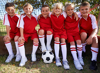 Image showing Kids, soccer team and portrait with ball, boys and girls with players, support or solidarity. Energy, sports and friendship, together and happy for win, ready for game or physical activity