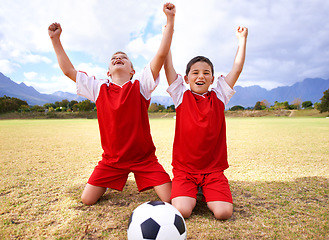 Image showing Children, soccer team and cheering for win and celebration, happy and victory in outdoors. People, kids and excited for achievement, collaboration and partnership or teamwork on field or sports