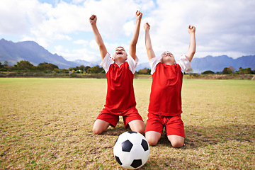 Image showing Children, soccer team and cheering for success and celebration, happy and victory in outdoors. People, kids and excited for achievement, collaboration and partnership or teamwork on field or sports