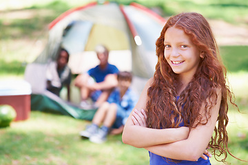 Image showing Child, portrait and relaxing at summer camp in outdoors, fun and smiling on vacation or holiday. Happy female person, kid and face or confident in park, childhood and adventure or freedom in nature