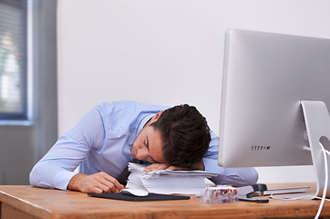 Image showing Business man, sleeping and burnout or tired at desk, professional and dreaming in workplace. Businessperson, nap and exhausted in office or resting, mental health and stress for paperwork or lazy