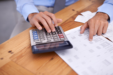 Image showing Hands, calculator and finance budget for company investment or tax, audit and accountant. Business person, professional and planning with bills or payment, closeup and expenses or paperwork on desk