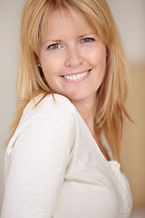 Image showing Happy, woman and smiling with portrait on face, morning and alone in home, natural beauty or headshot. Looking, beautiful or thinking with idea, mature person or cheerful lady in house or blonde hair