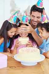 Image showing Birthday cake, kid and gift with covered eyes, surprise and happy family for celebration, siblings and dad. Singing, smile and love with presents, together and parent for childhood, party or home