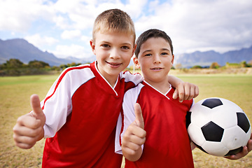 Image showing Happy boy, portrait and friends with thumbs up for soccer, winning or good match on outdoor field. Male person, children or kids smile with like emoji, yes sign or OK for football together in nature