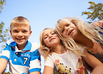 Image showing Happy children, portrait and playing at park for fun day, holiday or weekend together in nature. Face of young kids or siblings smile for outdoor summer break, bonding or youth on outdoor vacation