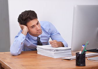 Image showing Business man, burnout and fatigue with paperwork, paralegal in office and stress about job. Overworked, bored and tired employee at desk with documents, exhausted and not interested in work