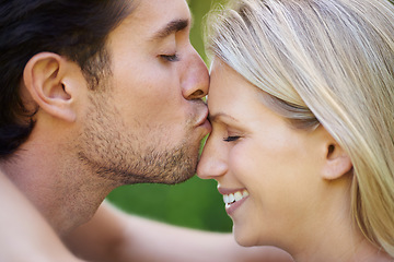 Image showing Couple, man kiss woman with love, commitment and care outdoor, Valentines day and healthy relationship. Loyalty, respect and trust with partner, people are bonding with affection and connection