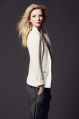 Image showing Woman, confidence and business clothes for fashion, beauty and wellness, model with pride on dark background. Corporate jacket, ambition and power with professional style or outfit in studio