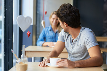 Image showing Back, flirting or happy man in cafe with a coffee to relax with smile, morning espresso or crush. Face, romance or person looking with tea, cappuccino or woman with love, peace or calm in restaurant