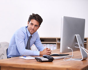 Image showing Businessman in office, thinking or planning with research, review and ideas for problem solving. Corporate, workflow and professional consultant in workplace for project vision, choice and solution