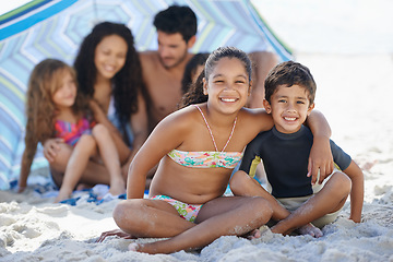 Image showing Girl, boy with family on beach and smile in portrait, summer vacation with hug, bonding and love. People outdoor, holiday in Brazil with sand and sun, children happy for travel and adventure together