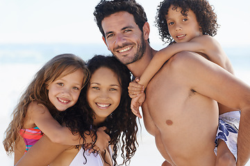 Image showing Happy family, portrait and hug for bonding, vacation or outdoor holiday weekend together. Father, mother and children smile for piggyback, love or back ride on summer break by ocean coast in nature