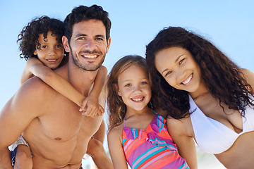 Image showing Family, parents and children are happy on beach, portrait while on vacation for summer and sun in Brazil. Travel, adventure and blue sky with people in nature with smile for love and bonding outdoor