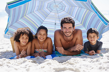 Image showing Father, children and family on beach, happy in portrait for summer vacation with parasol, bonding and love. People outdoor for holiday in Brazil with sand and sun, travel and adventure together