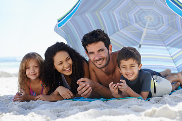 Image showing Parents, children and happy in portrait on beach, summer vacation with family, bonding and love. People outdoor, holiday in Brazil with sand and sun, fun with smile for travel and adventure together