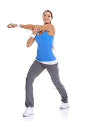 Image showing Fitness, portrait and woman stretching in studio for arm exercise, training or workout. Sports, health and young female person with muscle warm up for wellness activity isolated by white background.