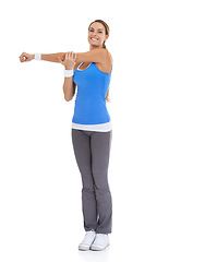 Image showing Fitness, smile and portrait of woman stretching in studio for arm exercise, training or workout. Sports, health and young female person with muscle warm up for wellness activity by white background.