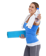 Image showing Yoga mat, water and portrait of woman in studio for exercise, training or workout. Happy, equipment and young female person with hydration drink for fitness or sports isolated by white background.