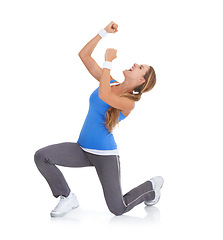 Image showing Excited woman, fitness and fist pump in celebration for winning isolated on a white studio background. Female person or athlete smile in relief for prize, achievement or good news on mockup space