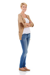 Image showing Happy woman, portrait and fashion standing with arms crossed on a white studio background. Young female person, model or blonde smile in confidence for denim style or casual clothing on mockup space