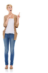 Image showing Happy woman, pointing up and advertising in marketing or fashion on a white studio background. Female person, model or blonde in surprise showing notification, alert or special offer on mockup space