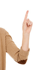 Image showing Person, hand and finger pointing with idea, solution or question on a white studio background. Closeup of raised arm for number, gesture or problem solving with answer or touch on mockup space