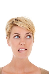 Image showing Woman, face and thinking on mockup space for choice or decision on a white studio background. Closeup of female person, model or blonde biting lip in wonder or thought for selection, idea or doubt