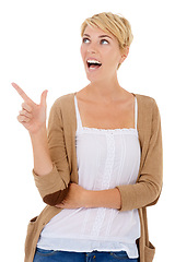 Image showing Happy woman, pointing and surprise for choice, decision or pick on a white studio background. Female person, model or blonde smile with finger for alert, notification or thinking on mockup space