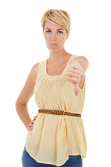 Image showing Frustrated woman, portrait and thumbs down for wrong, no or negative on a white studio background. Upset or disappointed female person, model or blonde with emoji, sign or disagree on mockup space