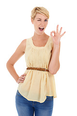 Image showing Happy woman, portrait and wink with okay sign for good job or perfect gesture on a white studio background. Female person, model or blonde smile with like emoji, yes or ok for approval or spot on