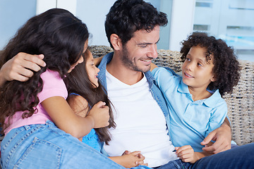 Image showing Happy, hugging and father with children on sofa for bonding, love and care at family home. Smile, fun and young dad embracing and having fun with kids on couch of living room at modern house together