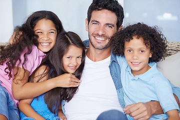 Image showing Smile, portrait and father with children on a sofa for relaxing, bonding or playing together at home. Care, love and portrait of happy young dad sitting with kids on couch in the living room of house