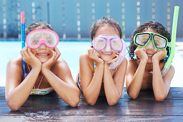 Image showing Pool, smile and portrait of children with goggles for swimming lesson, activity or hobby fun. Happy, snorkeling and girl kids with equipment for skill or tricks in water of outdoor backyard at home.