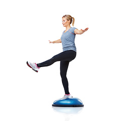 Image showing Athlete, bosu ball or leg balance in workout for body development isolated on white background. Woman, training equipment or fitness for studio mockup space, core challenge or exercise for wellness