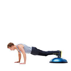 Image showing Man, fitness and push ups with bosu ball for exercise, workout or training on a white studio background. Active male person lifting body weight for strength, muscle or strong arms on mockup space