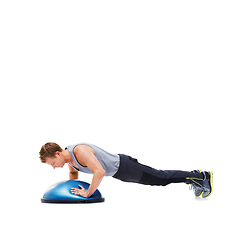 Image showing Man, training and half ball for plank in studio for fitness, strong exercise and gym with muscle health on floor. Bodybuilder or young sports model with push up or arms workout on a white background