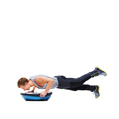 Image showing Man, training and push ups with bosu ball for fitness, exercise or workout on a white studio background. Active male person lifting body weight for strength, muscle or strong arms on mockup space