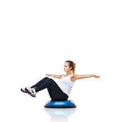 Image showing Balance, exercise and woman with bosu ball in workout, core training and wellness on white background. Muscle, strength and power with challenge on mockup space, athlete and fitness tools in studio
