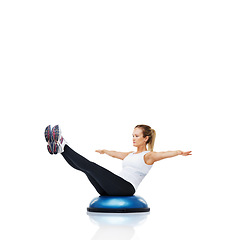 Image showing Balance, workout and woman with bosu ball for exercise, core training and wellness on white background. Muscle, strength and power with challenge on mockup space, athlete and fitness tools in studio