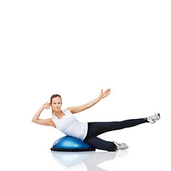 Image showing Woman, athlete and fitness with bosu ball for core training and muscle, balance and workout on white background. Exercise equipment, strength and endurance with mockup space and strong in studio