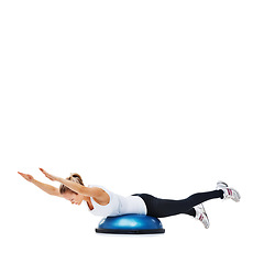 Image showing Woman, fitness and balance on bosu ball for core training, muscle and workout isolated on white background. Exercise equipment, strength and endurance with mockup space and strong athlete in studio