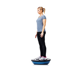 Image showing Profile of woman, bosu ball or balance in studio workout performance isolated on white background. Athlete, training equipment or fitness for mockup space, body challenge or exercise for wellness