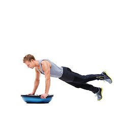 Image showing Man, body and push ups on bosu ball for fitness, exercise or workout on a white studio background. Young active male person lifting weight for strength, muscle or strong arms on mockup space