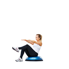 Image showing Woman, bosu ball and sit ups for exercise, workout or fitness on a white studio background. Young active female person or athlete on half round object in pilates, health and wellness on mockup space