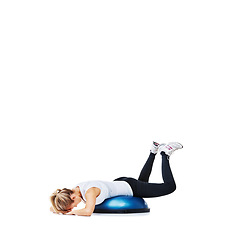 Image showing Woman, bosu ball and lying in fitness for balance, exercise or workout on a white studio background. Young active female person or athlete on half round object for health and wellness on mockup space